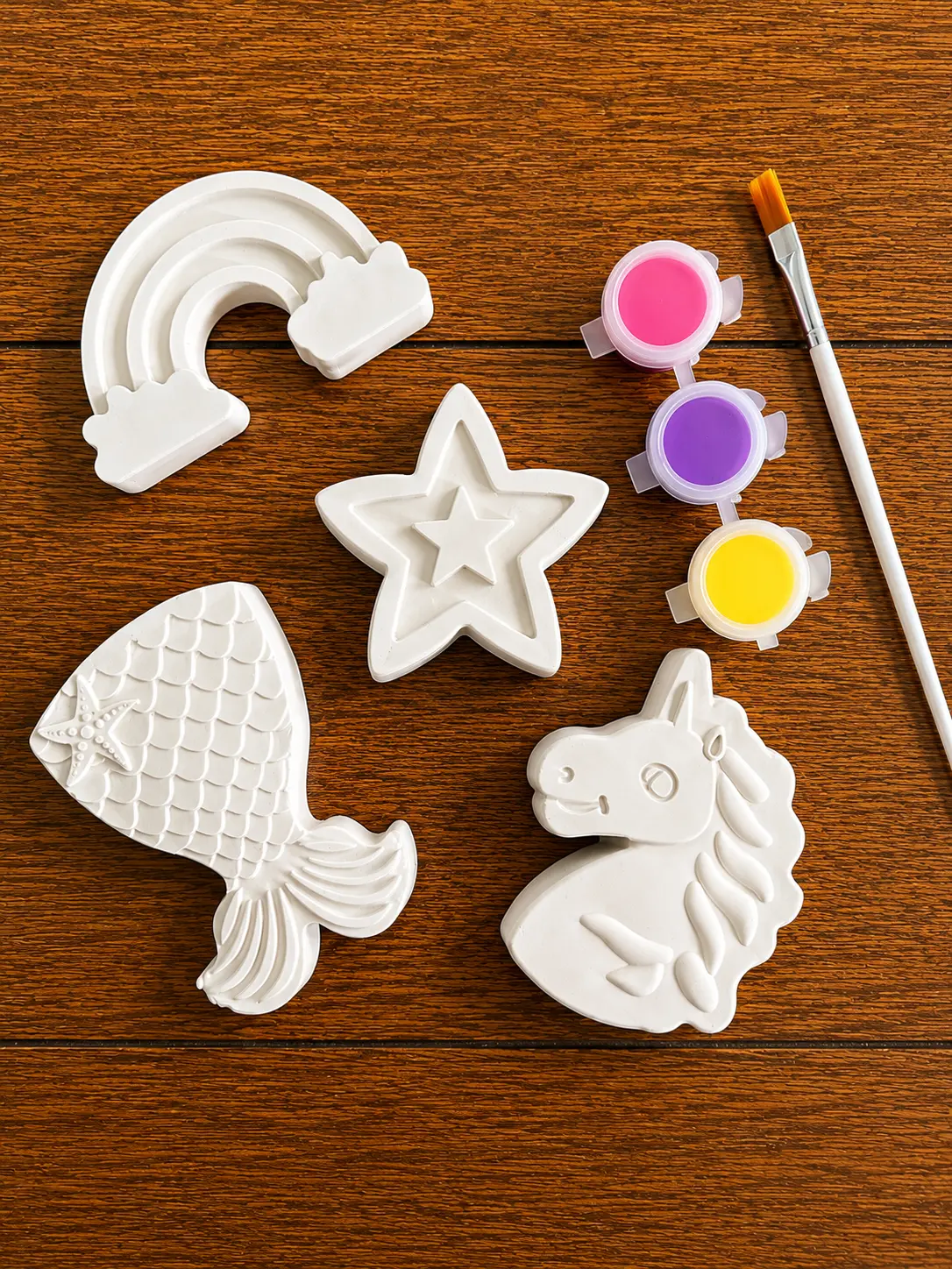 Rainbow, star and unicorn plaster figurines from a JAME Studio kit